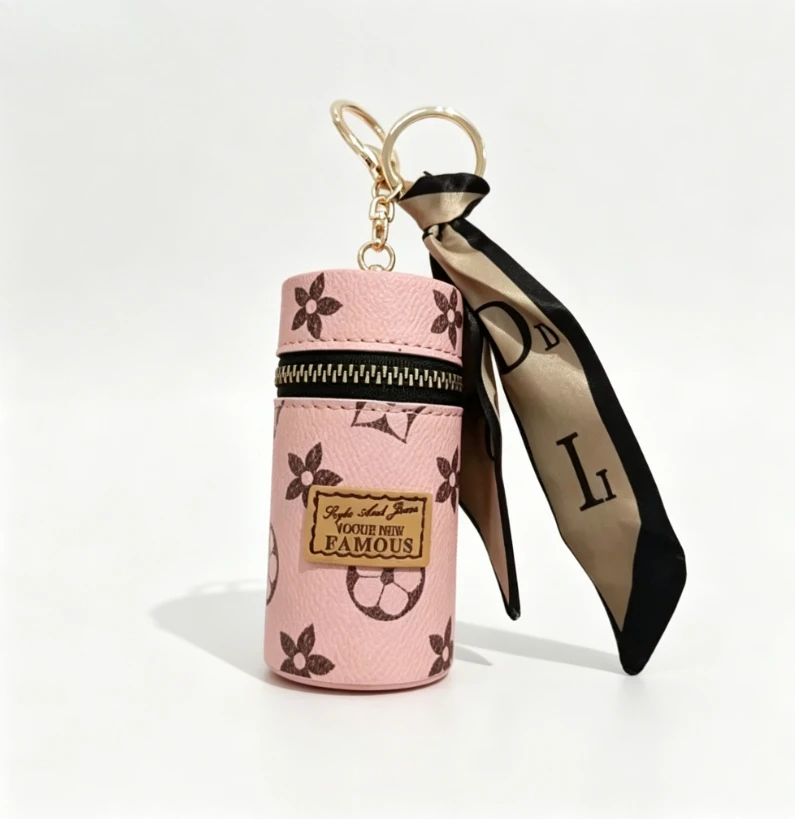 Bolsa cilíndrica mini para láp - Monogram Keychain Leather reseña y precio