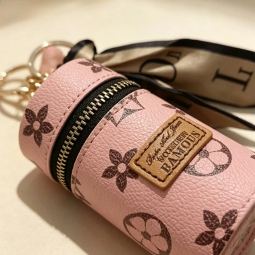 Bolsa cilíndrica mini para láp - Monogram Keychain Leather reseña y precio